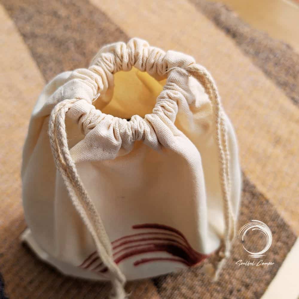 Top view of Soulful Camper drawstring bag with rustic rope closure